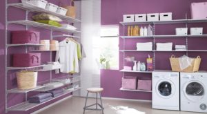 purple-paint-in-wall-of-laundry-room-with-white-washer-dryer